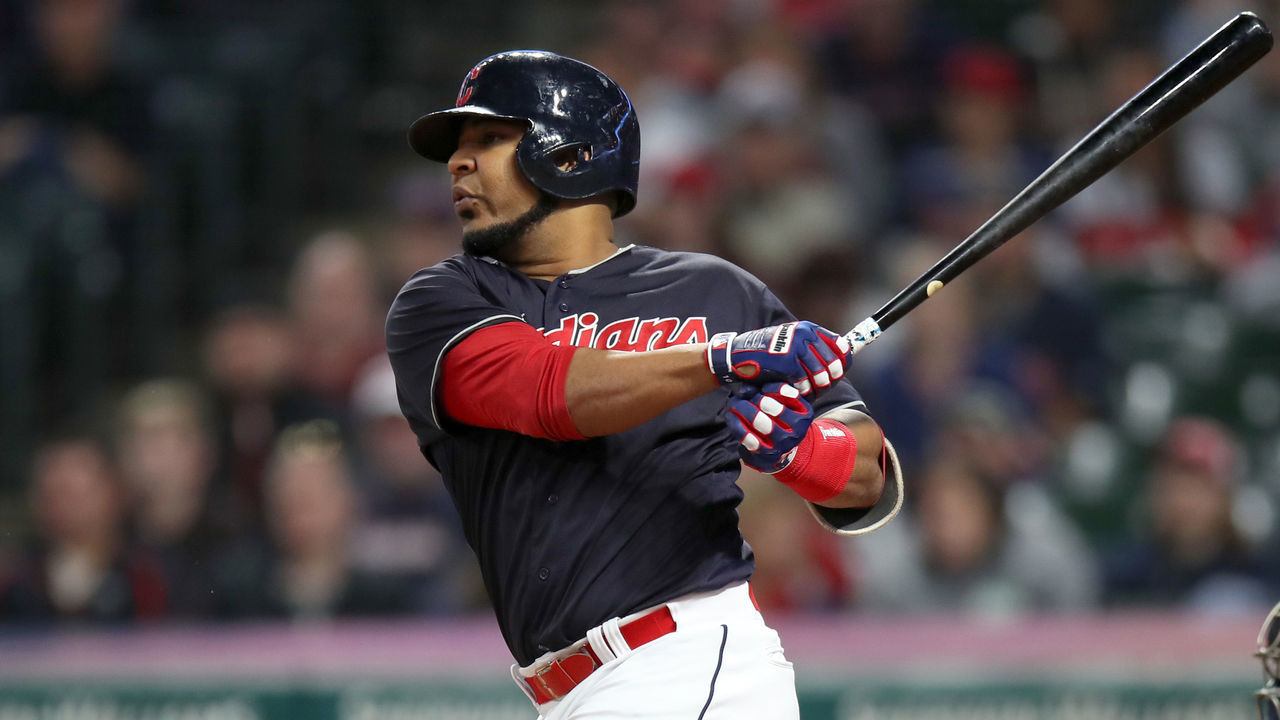 CLEVELAND, OH - SEPTEMBER 23: Cleveland Indians designated hitter Edwin Encarnacion (10) singles to center to drive in Cleveland Indians left fielder Michael Brantley (23) (not pictured) for his 100th RBI of the season during the fourth inning of the Major League Baseball game between the Boston Red Sox and Cleveland Indians on September 23, 2018, at Progressive Field in Cleveland, OH.