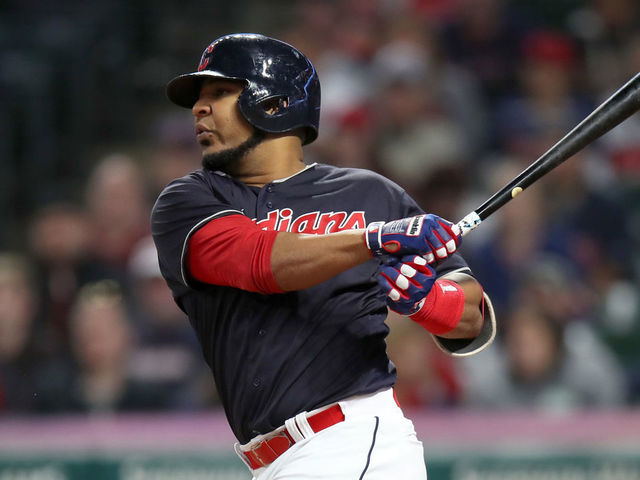 CLEVELAND, OH - SEPTEMBER 23: Cleveland Indians designated hitter Edwin Encarnacion (10) singles to center to drive in Cleveland Indians left fielder Michael Brantley (23) (not pictured) for his 100th RBI of the season during the fourth inning of the Major League Baseball game between the Boston Red Sox and Cleveland Indians on September 23, 2018, at Progressive Field in Cleveland, OH.