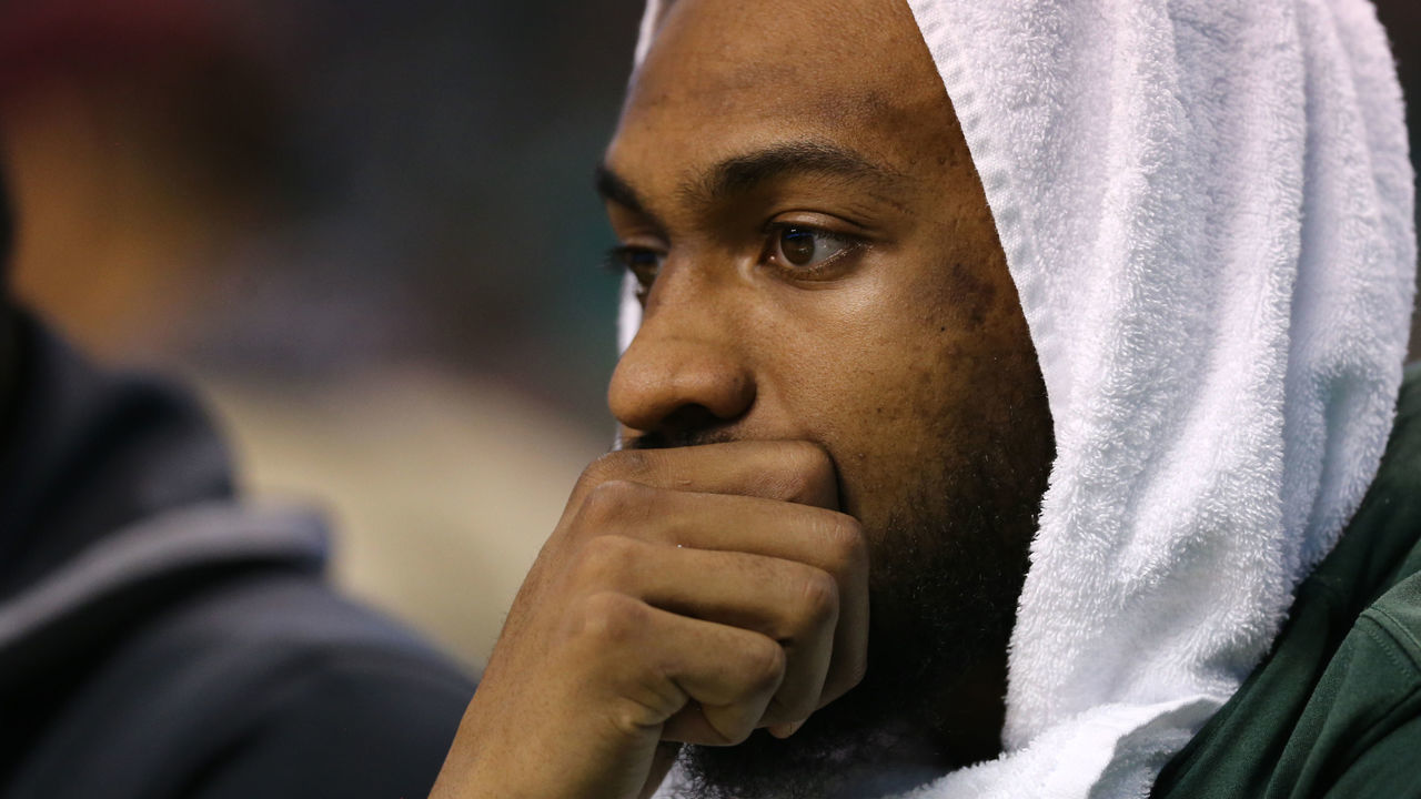 BOSTON, MA - APRIL 15: Jabari Parker #12 of the Milwaukee Bucks looks on from the bench during the third quarter of Game One of Round One of the 2018 NBA Playoffs against the Boston Celtics during at TD Garden on April 15, 2018 in Boston, Massachusetts.