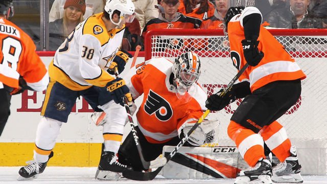 PHILADELPHIA, PENNSYLVANIA - DECEMBER 20: Carter Hart #79 of the Philadelphia Flyers makes the second period save on Ryan Hartman #38 of the Nashville Predators at the Wells Fargo Center on December 20, 2018 in Philadelphia, Pennsylvania.
