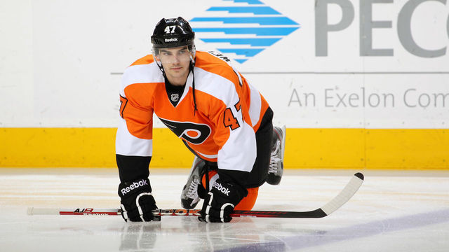 PHILADELPHIA, PA - FEBRUARY 16: Eric Wellwood #47 of the Philadelphia Flyers stretches during warm-ups prior to his game against the Buffalo Sabres on February 16, 2012 at the Wells Fargo Center in Philadelphia, Pennsylvania.