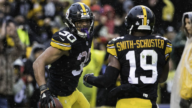PITTSBURGH, PA - OCTOBER 28: Pittsburgh Steelers running back James Conner (30) and Pittsburgh Steelers wide receiver JuJu Smith-Schuster (19) celebrate after a touchdown during the NFL football game between the Cleveland Browns and the Pittsburgh Steelers on October 28, 2018 at Heinz Field in Pittsburgh, PA.