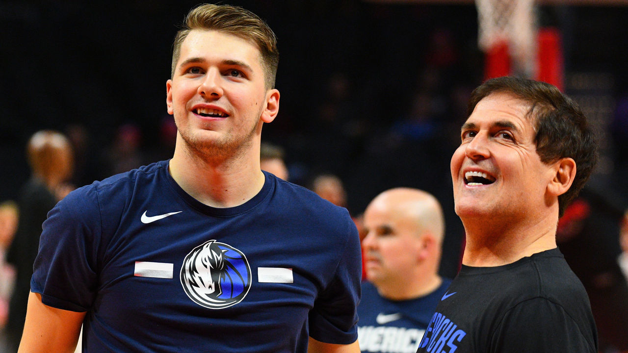 LOS ANGELES, CA - DECEMBER 20: Dallas Mavericks Guard Luka Doncic (77) looks on with owner Mark Cuban before a NBA game between the Dallas Mavericks and the Los Angeles Clippers on December 20, 2018 at STAPLES Center in Los Angeles, CA.