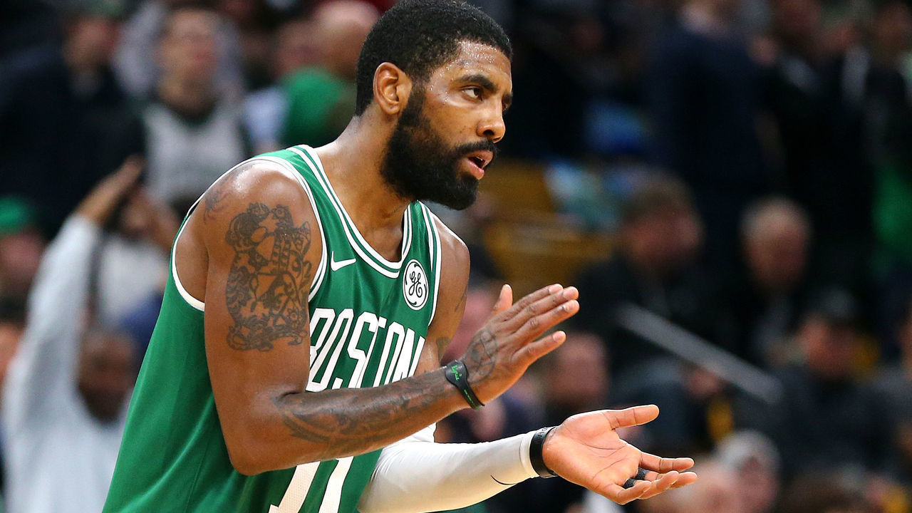 BOSTON, MASSACHUSETTS - DECEMBER 21: Kyrie Irving #11 of the Boston Celtics reacts during the game against the Milwaukee Bucks at TD Garden on December 21, 2018 in Boston, Massachusetts.