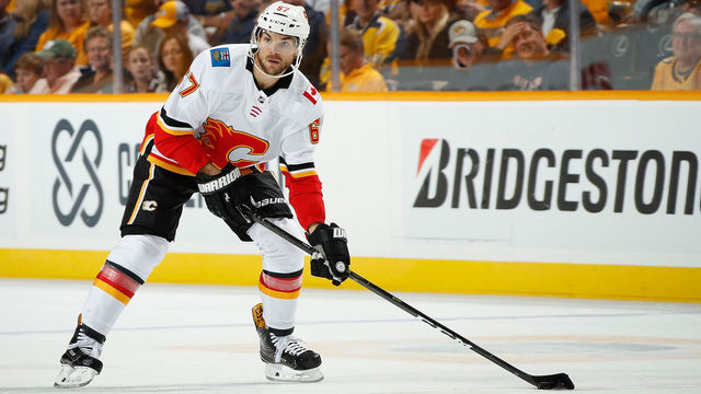 NASHVILLE, TN - OCTOBER 9: Michael Frolik #67 of the Calgary Flames skates against the Nashville Predators at Bridgestone Arena on October 9, 2018 in Nashville, Tennessee.