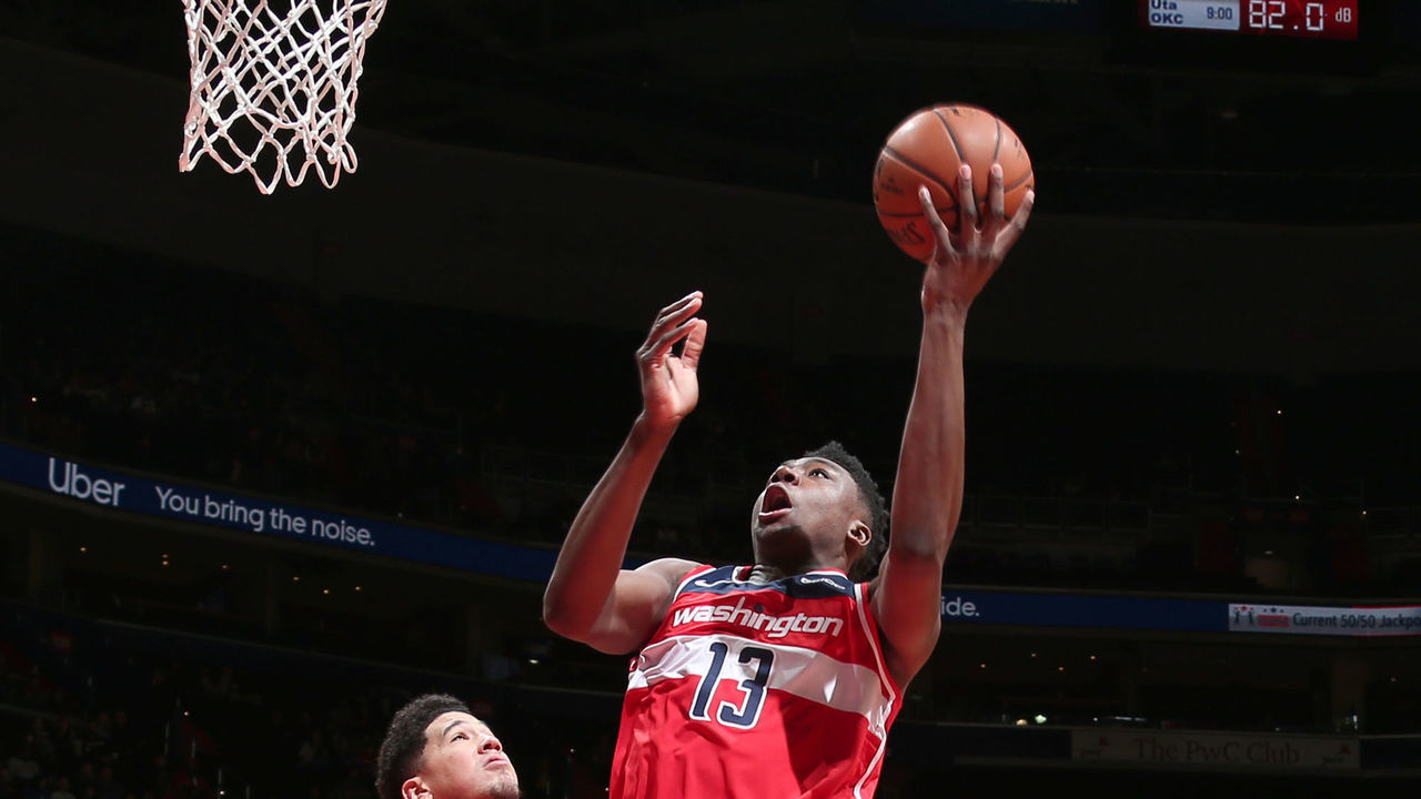 WASHINGTON, DC - DECEMBER 22: Thomas Bryant #13 of the Washington Wizards goes to the basket against the Phoenix Suns on December 22, 2018 at Capital One Arena in Washington, DC. NOTE TO USER: User expressly acknowledges and agrees that, by downloading and/or using this photograph, user is consenting to the terms and conditions of the Getty Images License Agreement. Mandatory Copyright Notice: Copyright 2018 NBAE