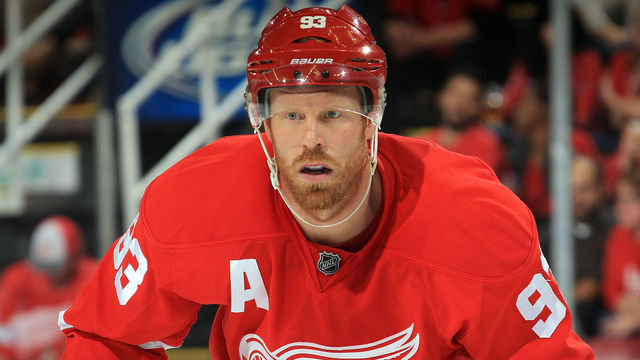 DETROIT, MI - OCTOBER 15: Johan Franzen #93 of the Detroit Red Wings gets set for the face-off during a NHL game against the Boston Bruins on October 15, 2014 at Joe Louis Arena in Detroit, Michigan. The Bruins won 3-2 in a shoot-out (Dave Reginek/NHLI via Getty Images)