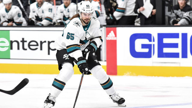 SAN JOSE, CA - DECEMBER 22: Erik Karlsson #65 of the San Jose Sharks skates ahead with the puck against the Los Angeles Kings at SAP Center on December 22 2018 in San Jose, California
