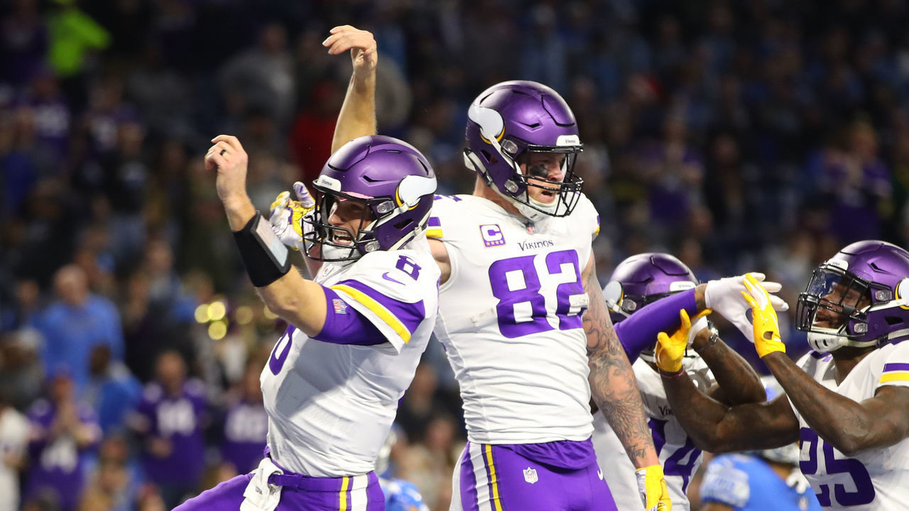 DETROIT, MI - DECEMBER 23: Kirk Cousins #8 of the Minnesota Vikings and Kyle Rudolph #82 of the Minnesota Vikings celebrate a touchdown in the second quarter against the Detroit Lions at Ford Field on December 23, 2018 in Detroit, Michigan.