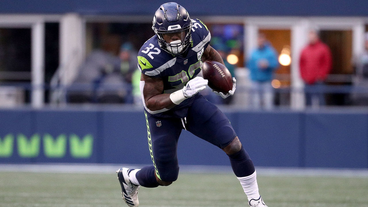 SEATTLE, WA - DECEMBER 02: Chris Carson #32 of the Seattle Seahawks runs with the ball in the third quarter against the San Francisco 49ers during their game at CenturyLink Field on December 2, 2018 in Seattle, Washington.