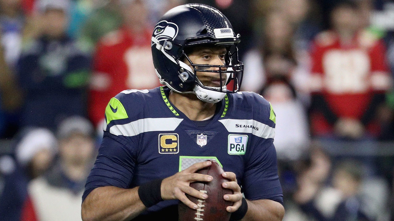 SEATTLE, WA - DECEMBER 23: Quarterback Russell Wilson #3 of the Seattle Seahawks looks to pass from the pocket during the first quarter of the game against the Kansas City Chiefs at CenturyLink Field on December 23, 2018 in Seattle, Washington.