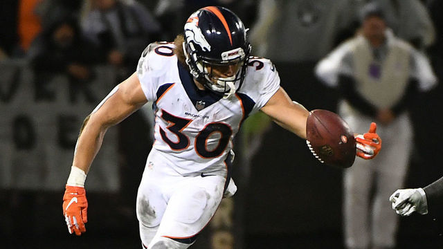 OAKLAND, CA - DECEMBER 24: Phillip Lindsay #30 of the Denver Broncos catches a lateral against the Oakland Raiders during their NFL game at Oakland-Alameda County Coliseum on December 24, 2018 in Oakland, California.