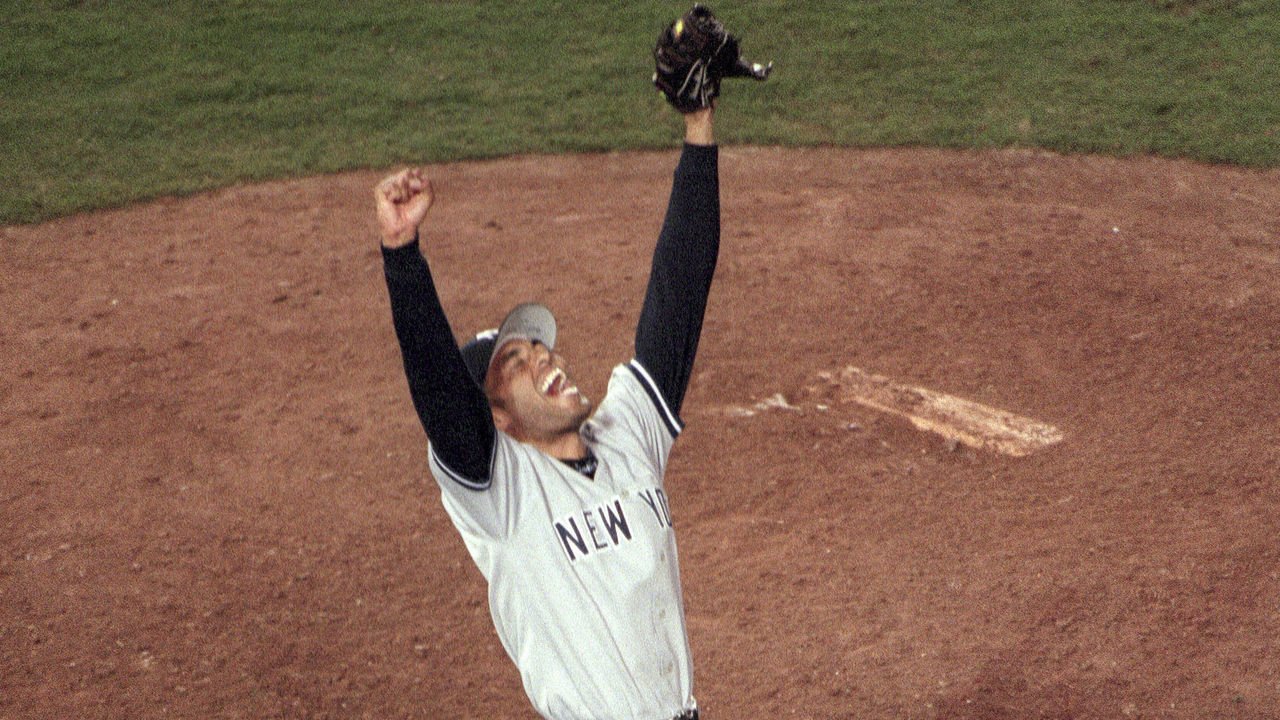 SAN DIEGO, CA - OCTOBER 21 : Mariano Rivera #42 of the New York Yankees celebrates after the final out of GM 4 to defeat the San Diego Padres in 1998 World Series on October 21, 1998 at Qualcomm Stadium in San Diego, California. The Yankees won the series 4 games to 0.