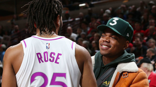 CHICAGO, IL - DECEMBER 26: Chance the Rapper daps up Derrick Rose #25 of the Minnesota Timberwolves during the game against the Chicago Bulls on December 26, 2018 at the United Center in Chicago, Illinois. Mandatory Copyright Notice: Copyright 2018 NBAE