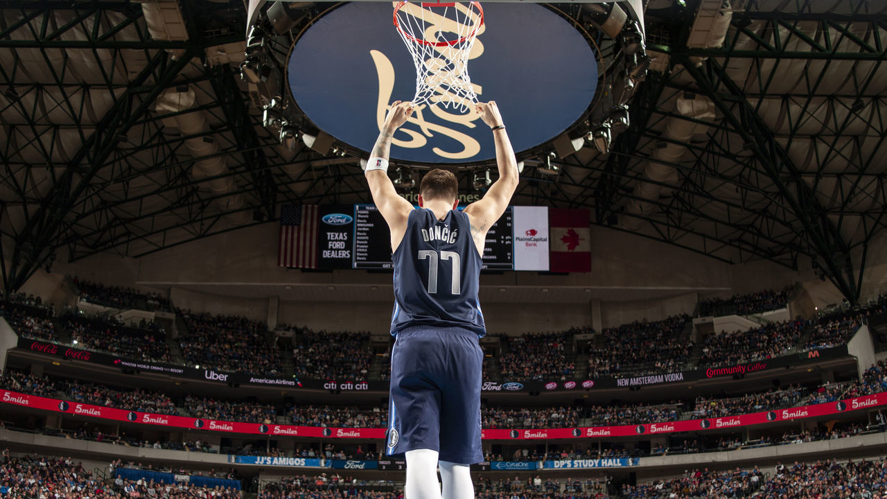 DALLAS, TX - DECEMBER 26: Luka Doncic #77 of the Dallas Mavericks celebrates after play against the New Orleans Pelicans on December 26, 2018 at the American Airlines Center in Dallas, Texas. Mandatory Copyright Notice: Copyright 2018 NBAE