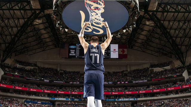 DALLAS, TX - DECEMBER 26: Luka Doncic #77 of the Dallas Mavericks celebrates after play against the New Orleans Pelicans on December 26, 2018 at the American Airlines Center in Dallas, Texas. Mandatory Copyright Notice: Copyright 2018 NBAE