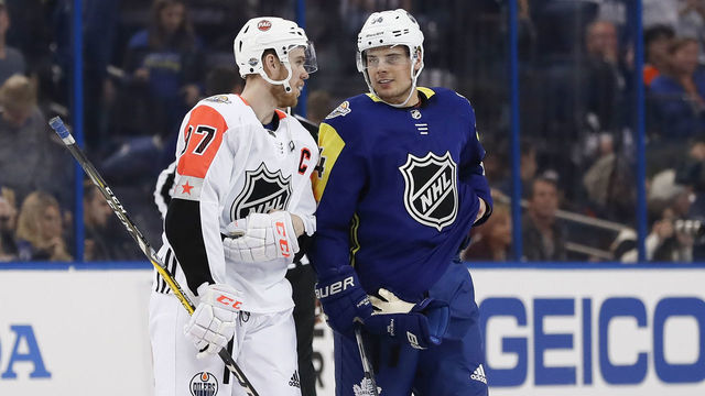 TAMPA, FL - JANUARY 28: Edmonton Oilers forward Connor McDavid (97) and Toronto Maple Leafs forward Auston Matthews (34) talk during the 2018 NHL All-Star Game between the Pacific Division All-Stars and Atlantic Division All-Stars on January 28, 2018 at Amalie Arena in Tampa, FL.
