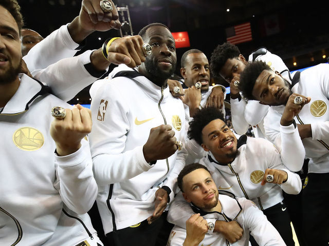 OAKLAND, CA - OCTOBER 16: Stephen Curry #30 and the Golden State Warriors celebrate after receiving their 2017-2018 Championship rings prior to their game against the Oklahoma City Thunder at ORACLE Arena on October 16, 2018 in Oakland, California.