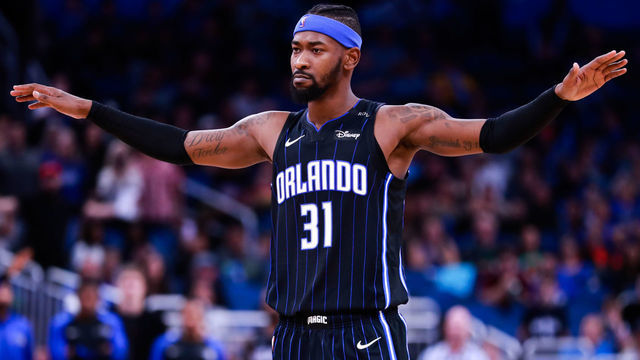 ORLANDO, FLORIDA - DECEMBER 26: Terrence Ross #31 of the Orlando Magic quiets the crowd as they prepare for free throws against the Phoenix Suns in the closing moments of the fourth quarter at Amway Center on December 26, 2018 in Orlando, Florida.