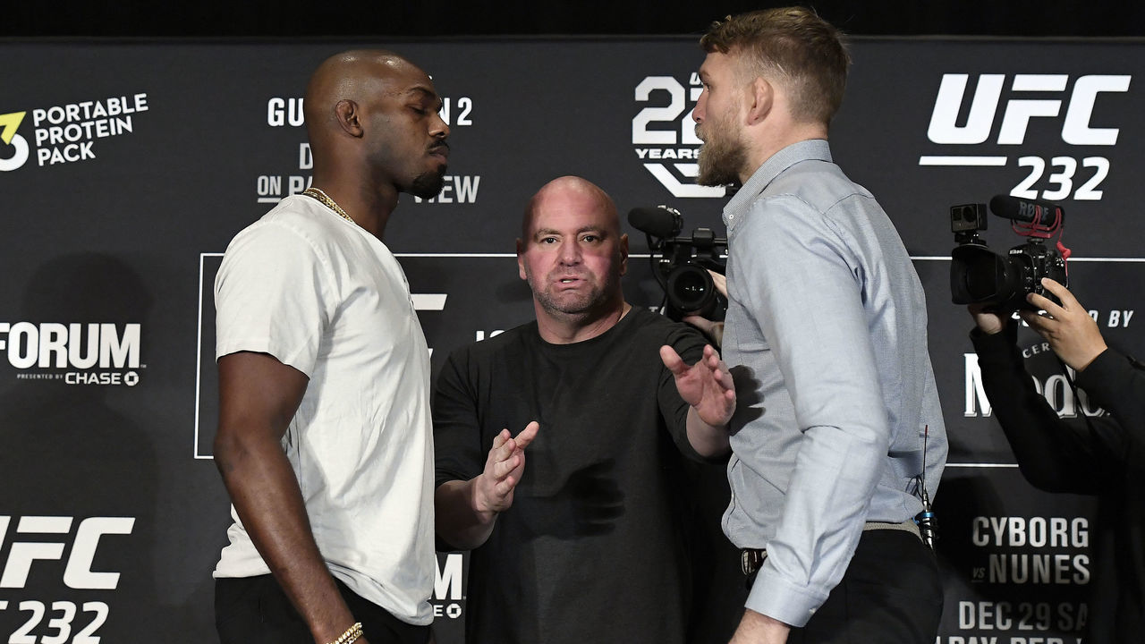 LOS ANGELES, CA - DECEMBER 27: UFC President Dana White (C) separates opponents Jon Jones (L) and Alexander Gustafsson of Sweden during the UFC 232 press conference on December 27, 2018 in Los Angeles, California.