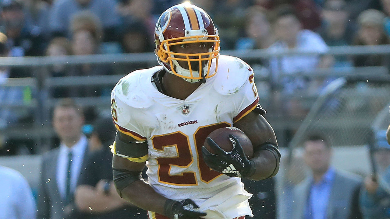 JACKSONVILLE, FLORIDA - DECEMBER 16: Adrian Peterson #26 of the Washington Redskins runs for yardage during the game against the Jacksonville Jaguars at TIAA Bank Field on December 16, 2018 in Jacksonville, Florida.