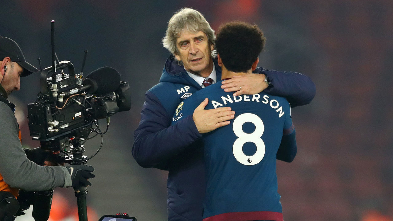 SOUTHAMPTON, ENGLAND - DECEMBER 27: Manuel Pellegrini, Manager of West Ham United embraces Felipe Anderson of West Ham United at the end of the match as a camera films them during the Premier League match between Southampton FC and West Ham United at St Mary's Stadium on December 27, 2018 in Southampton, United Kingdom.