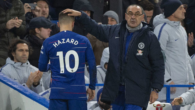 LONDON, ENGLAND - DECEMBER 08: Chelsea Manager Maurizio Sarri gives Eden Hazard a pat on the head after being substituted during the Premier League match between Chelsea FC and Manchester City at Stamford Bridge on December 8, 2018 in London, United Kingdom.