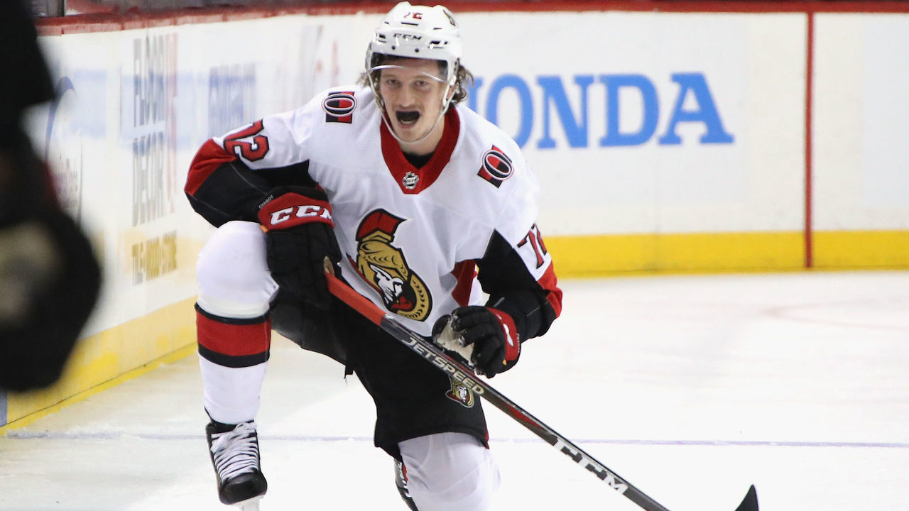 NEW YORK, NEW YORK - DECEMBER 28: Thomas Chabot #72 of the Ottawa Senators pauses after a second period hit by Matt Martin #17 of the New York Islanders at the Barclays Center on December 28, 2018 in the Brooklyn borough of New York City.