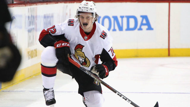 NEW YORK, NEW YORK - DECEMBER 28: Thomas Chabot #72 of the Ottawa Senators pauses after a second period hit by Matt Martin #17 of the New York Islanders at the Barclays Center on December 28, 2018 in the Brooklyn borough of New York City.