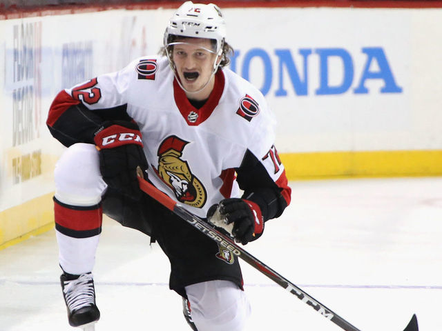 NEW YORK, NEW YORK - DECEMBER 28: Thomas Chabot #72 of the Ottawa Senators pauses after a second period hit by Matt Martin #17 of the New York Islanders at the Barclays Center on December 28, 2018 in the Brooklyn borough of New York City.