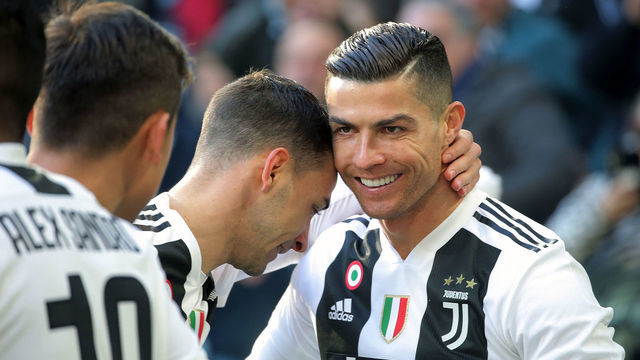 TURIN, ITALY - DECEMBER 29: Cristiano Ronaldo #7 of Juventus FC celebrates with team-mates after scoring the his goal during the serie A match between Juventus FC and UC Sampdoria at Allianz Stadium on December 29, 2018 in Turin, Italy.