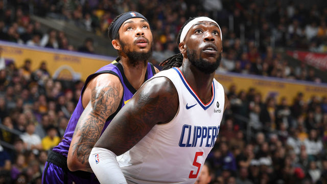 LOS ANGELES, CA - DECEMBER 28: Brandon Ingram #14 of the Los Angeles Lakers and Montrezl Harrell #5 of the LA Clippers wait for a rebound during the game on December 28, 2018 at STAPLES Center in Los Angeles, California. NOTE TO USER: User expressly acknowledges and agrees that, by downloading and/or using this photograph, user is consenting to the terms and conditions of the Getty Images License Agreement. Mandatory Copyright Notice: Copyright 2018 NBAE