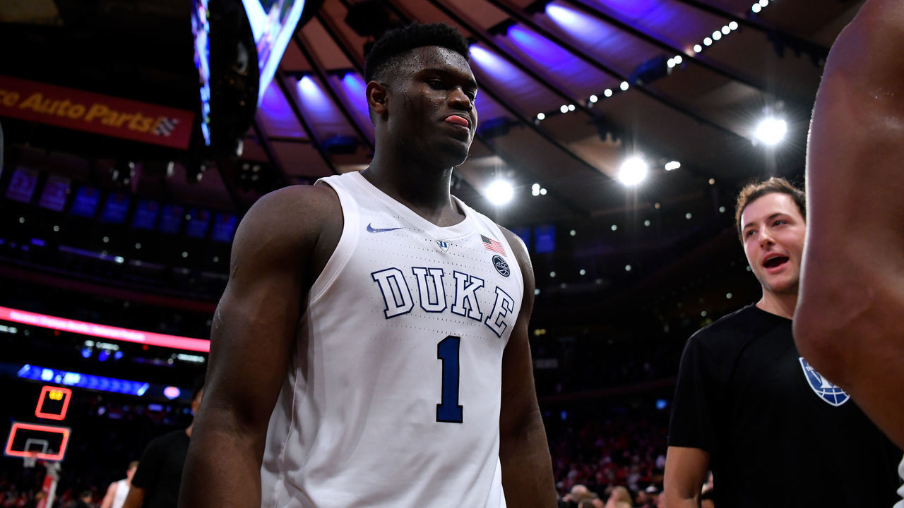 NEW YORK, NY - DECEMBER 20: Zion Williamson #1 and Brennan Besser #53 of the Duke Blue Devils walk off the court following their win against the Texas Tech Red Raiders at Madison Square Garden on December 20, 2018 in New York City.