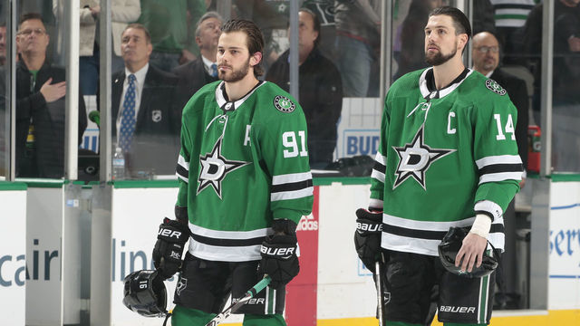 DALLAS, TX - DECEMBER 18: Jamie Benn #14 and Tyler Seguin #91 of the Dallas Stars before a game against the Calgary Flames at the American Airlines Center on December 18, 2018 in Dallas, Texas.