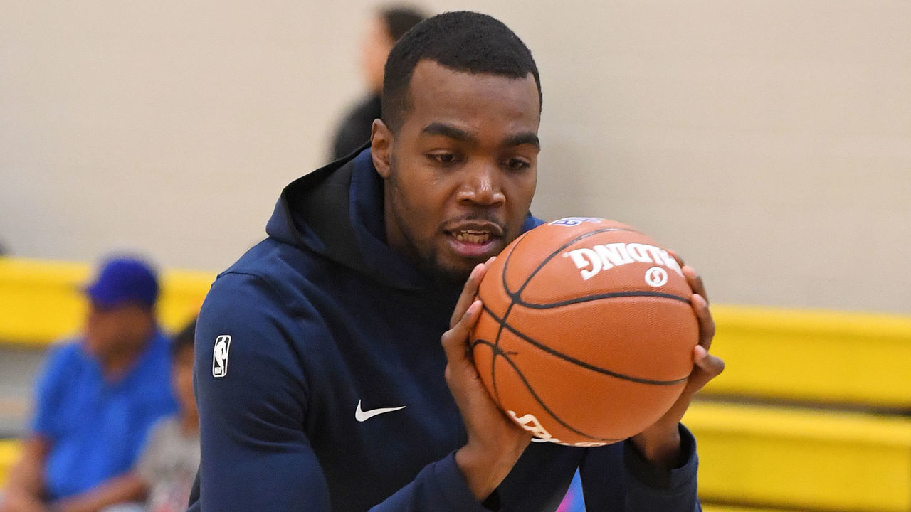 DENVER, CO - DECEMBER 19: Paul Milsap #4 of the Denver Nuggets hosts a Western Union basketball clinic on December 19, 2018 at Montbello Recreation Center in Denver, Colorado. NOTE TO USER: User expressly acknowledges and agrees that, by downloading and/or using this Photograph, user is consenting to the terms and conditions of the Getty Images License Agreement. Mandatory Copyright Notice: Copyright 2018 NBAE