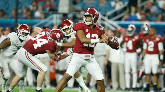MIAMI, FL - DECEMBER 29: Tua Tagovailoa #13 of the Alabama Crimson Tide looks to pass in the fourth quarter during the College Football Playoff Semifinal against the Oklahoma Sooners at the Capital One Orange Bowl at Hard Rock Stadium on December 29, 2018 in Miami, Florida.