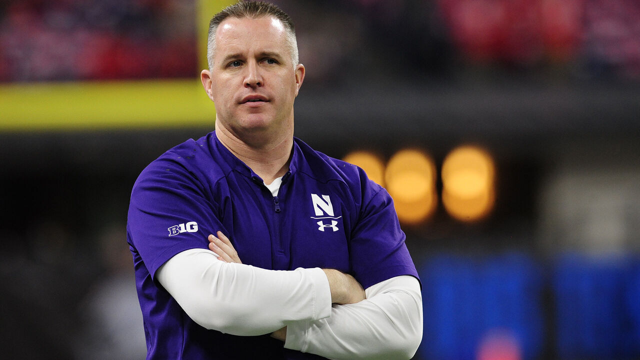 INDIANAPOLIS, IN - DECEMBER 01: Northwestern Wildcats head coach Pat Fitzgerald looks on during the Big Ten Conference Championship college football game between the Northwestern Wildcats and the Ohio State Buckeyes on December 1, 2018, at Lucas Oil Stadium in Indianapolis, Indiana.