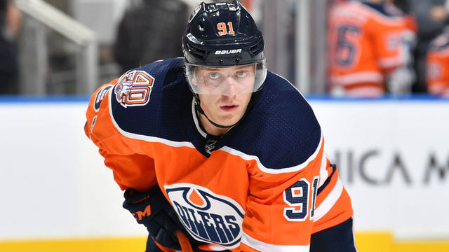 EDMONTON, AB - OCTOBER 25: Drake Caggiula #91 of the Edmonton Oilers lines up for a face off during the game against the Washington Capitals on October 25, 2018 at Rogers Place in Edmonton, Alberta, Canada.