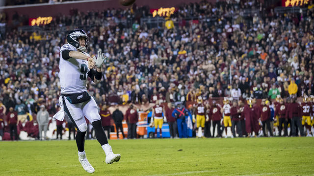 LANDOVER, MD - DECEMBER 30: Nick Foles #9 of the Philadelphia Eagles throws a pass for a touchdown against the Washington Redskins during the first half at FedExField on December 30, 2018 in Landover, Maryland.