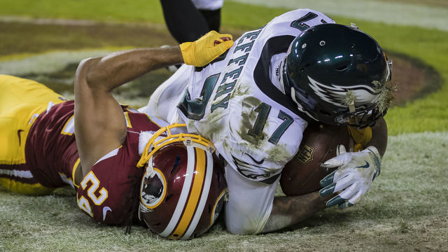 LANDOVER, MD - DECEMBER 30: Alshon Jeffery #17 of the Philadelphia Eagles catches a pass for a touchdown against Josh Norman #24 of the Washington Redskins during the first half at FedExField on December 30, 2018 in Landover, Maryland.