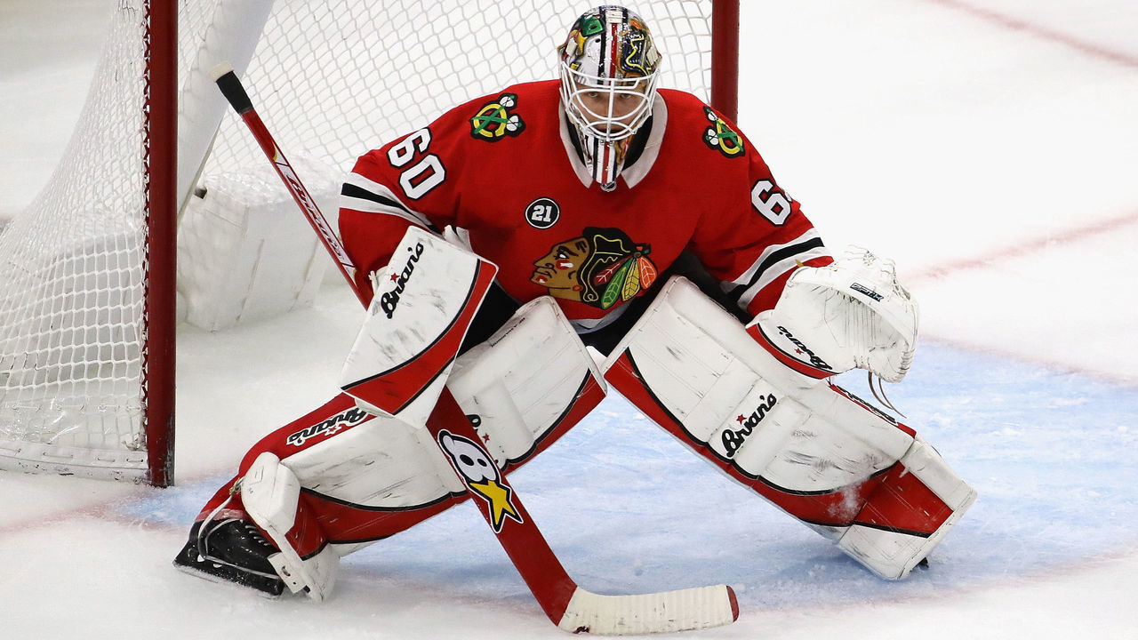 CHICAGO, IL - DECEMBER 27: Collin Delia #60 of the Chicago Blackhawks minds the net against the Minnesota Wild at the United Center on December 27, 2018 in Chicago, Illinois. The Blackhawks defeated the Wild 5-2.