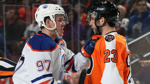 PHILADELPHIA, PA - DECEMBER 08: Brandon Manning #23 of the Philadelphia Flyers scuffles with Connor McDavid #97 of the Edmonton Oilers in the second period on December 8, 2016 at the Wells Fargo Center in Philadelphia, Pennsylvania.