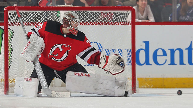 NEWARK, NJ - DECEMBER 31: Mackenzie Blackwood #29 of the New Jersey Devils eyes the puck after making a save against the Vancouver Canucks during the game at Prudential Center on December 31, 2018 in Newark, New Jersey.
