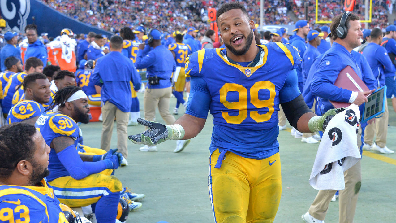 LOS ANGELES, CA - DECEMBER 30: Los Angeles Rams defensive end Aaron Donald (99) relaxes on the sidelines with his teammates in Los Angeles on Sunday, Dec. 30, 2018. The Rams beat the 49ers 48-32.