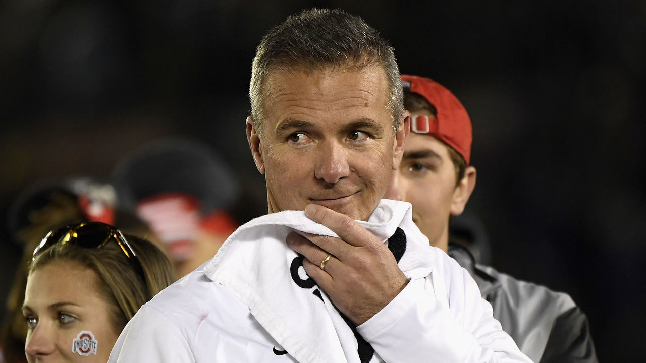 PASADENA, CA - JANUARY 01: Ohio State Buckeyes head coach Urban Meyer and wife Shelley Meyer celebrate after the Ohio State Buckeyes win the Rose Bowl Game presented by Northwestern Mutual at the Rose Bowl on January 1, 2019 in Pasadena, California.