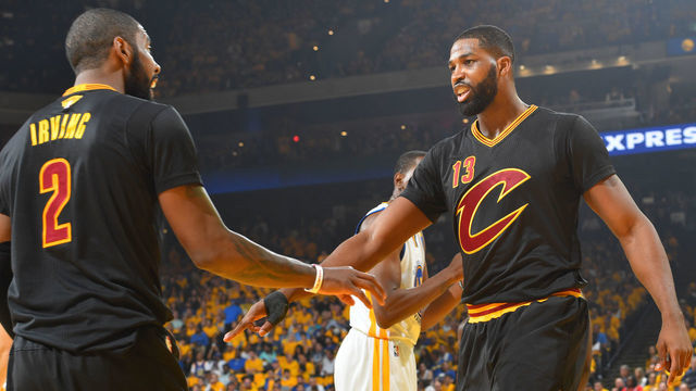 OAKLAND, CA - JUNE 4: Kyrie Irving #2 and Tristan Thompson #13 of the Cleveland Cavaliers high five in Game Two of the 2017 NBA Finals against the Golden State Warriors at Oracle Arena on June 4, 2017 in Oakland, California. NOTE TO USER: User expressly acknowledges and agrees that, by downloading and/or using this Photograph, user is consenting to the terms and conditions of the Getty Images License Agreement. Mandatory Copyright Notice: Copyright 2017 NBAE