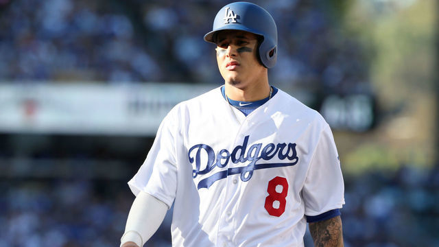 LOS ANGELES, CA - OCTOBER 17: Manny Machado #8 of the Los Angeles Dodgers takes first after being hit by a pitch in the sixth inning of Game 5 of the NLCS against the Milwaukee Brewers at Dodger Stadium on Wednesday, October 17, 2018 in Los Angeles, California.