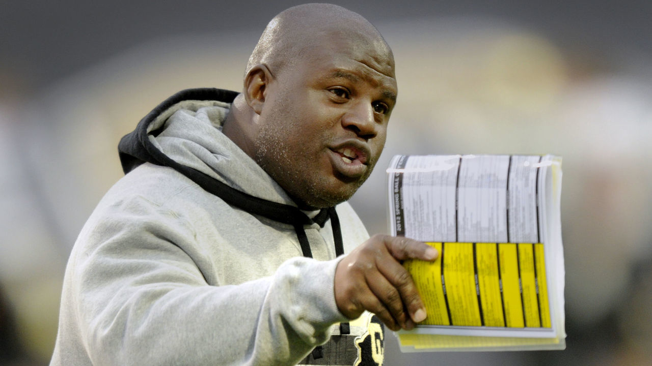 Buffs offensive coordinator Eric Bienemy made a point during practice Saturday night in Boulder. The University of Colorado football team scrimmaged Saturday night, April 14, 2012 during a practice session open to the public at Folsom Field. Karl Gehring/The Denver Post