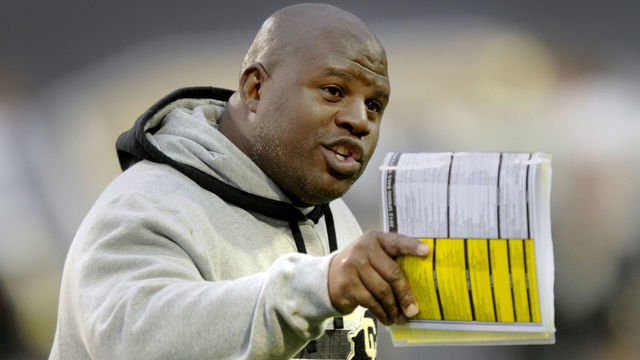 Buffs offensive coordinator Eric Bienemy made a point during practice Saturday night in Boulder. The University of Colorado football team scrimmaged Saturday night, April 14, 2012 during a practice session open to the public at Folsom Field. Karl Gehring/The Denver Post