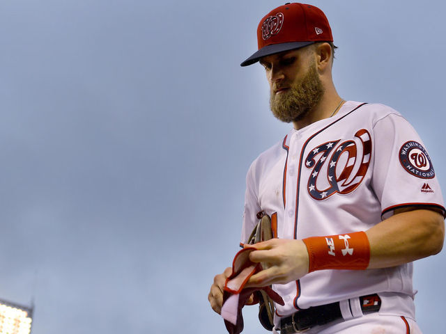WASHINGTON, DC - SEPTEMBER 23: Washington Nationals center fielder Bryce Harper (34) heads to the dugout in the game against the New York Mets at Nationals Park September 23, 2018 in Washington, DC. The Washington Nationals lost to the New York Mets 8-6 in the last home stand of the season.